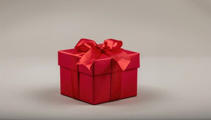 Obraz premium Holiday season close-up featuring a solitary red gift box in macro detail