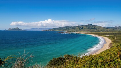 Seaside panorama featuring a distant island and tranquil waters during summer