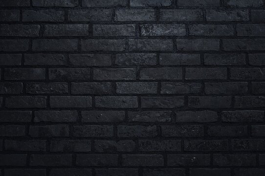 Dark backdrop featuring black brick texture for design