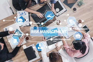 Teams engage in risk management discussions using digital tools to enhance decision-making and security. Innovative strategies are explored for effective problem-solving. Tessel