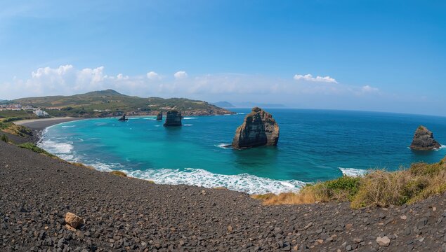 Scenic volcanic shoreline with striking rock formations and deep blue waters