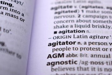 English Definition Dictionary Page Close Up Of Printed Word Of -Agitator