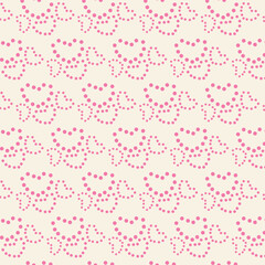 Cute seamless pattern with dotted pink hearts. Romantic minimal design for Valentine's Day wrapping paper, fabric, textile, wallpaper, or digital background