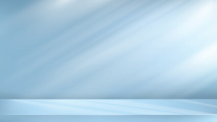Soft Blue Studio Stage Background With Reflective Surface and Light Rays