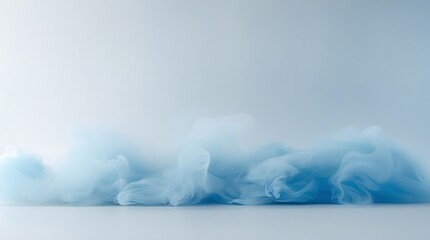 Wisps of soft blue cloudy smoke gently rising abstract visual element