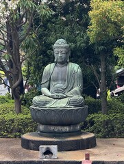 
Statue of buddha in the garden of a Buddhist temple in Japan
