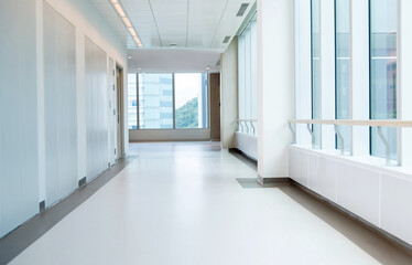 Empty long corridor in modern hospital