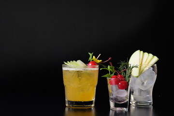 A vibrant cocktail with garnishes, perfect for a refreshing drink