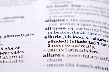 Fototapeta premium Close Up Of English Dictionary Page With Word - allude