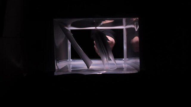 Receiving and sending mail inside a transparent box