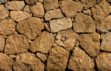 Natural stone wall as background in Cyprus