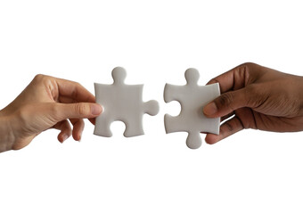 Hands connecting two white jigsaw puzzle pieces for a teamwork solution isolated on transparent white background 