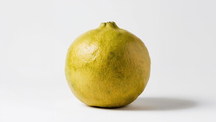 Single pomelo against a plain white background