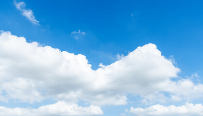 Background of blue sky with big white cloud