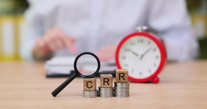 Exploring the importance of time management and budget planning with coins and a clock in focus - Powered by Adobe