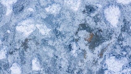 Obraz premium Winter scene of snow-covered natural stone surface from above. Banner.