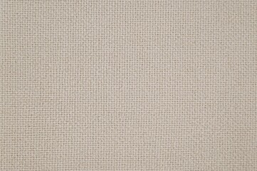 Fototapeta premium Detailed close-up of a finely woven textile displaying a consistent pattern and delicate texture