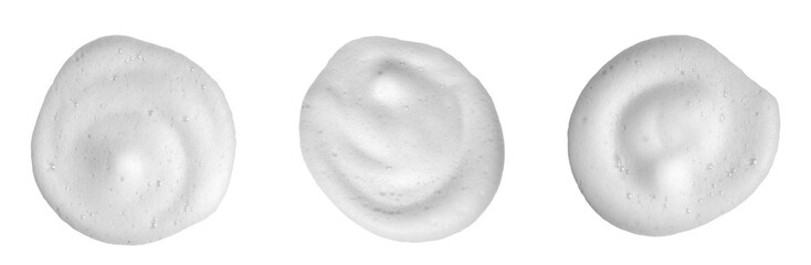 White foam texture from skincare or shaving cream isolated on white background. Perfect for cosmetic advertising, hygiene design, beauty product promotion, or clean minimal background concept.