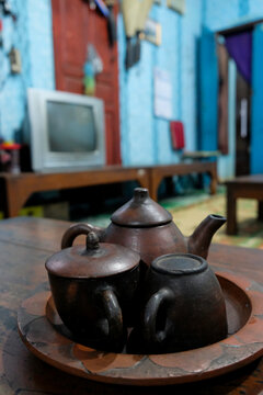 Tea in claypot or teh poci is a traditional Javanese tea served in clay tea pot and cup with rock sugar
