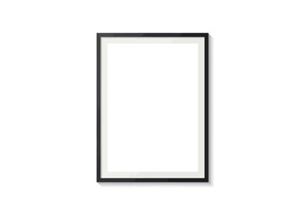 Portraitoriented black frame with a white matte isolated against a white backdrop