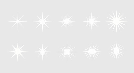 Collection of ten white starbursts on a light gray background, varying in size and ray count.