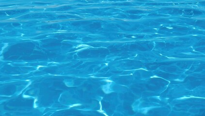 Blue water surface with waves and ripples texture, summer nature background for banner or medical beauty themes