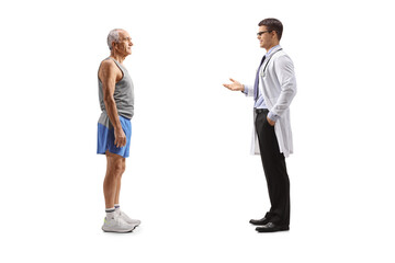 Doctor talking to a fit senior man in sportswear