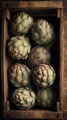 Obraz premium Fresh artichokes arranged in a box, perfect for culinary delights and healthy dishes
