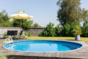 Contemporary resort-style yard with crystal-clear pool