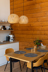 Contemporary kitchen with wooden details, minimalistic interior design, modern furniture with accessories