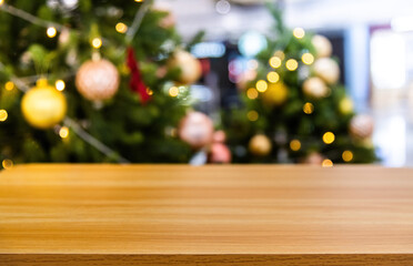 Wood table in front of Christmas tree