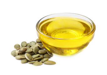 Pumpkin seeds and oil isolated on white