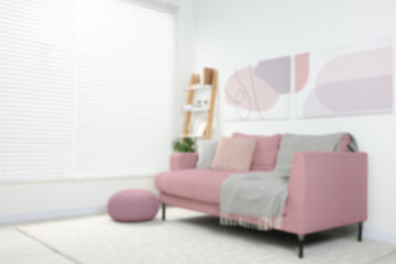 Living room with sofa, blurred view. Interior design