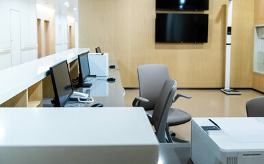 Hospital reception with phone and computers