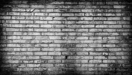 Vintage Brick Wall with Cracks in Monochrome