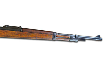 Horizontal wooden rifle with attached bayonet, metal fittings Barrel extends from left to right...