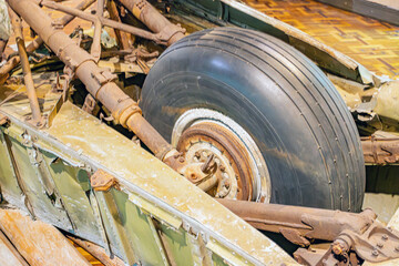 Crashed heavy machinery, possibly a truck or industrial vehicle, in partial dismantle Damaged...