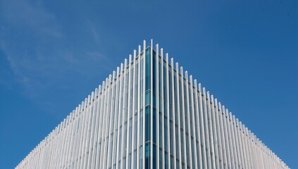 Contemporary structures at an angle. Clean edges in sleek architectural style. motif,abstract,design,building,architecture,geometric,modernity,glass,clear sky,lines