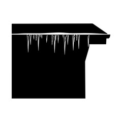 Icicles hanging from garage roof silhouette