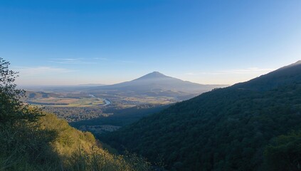 Fototapeta premium Scenic Overlook of a Hillside and Surrounding Landscape