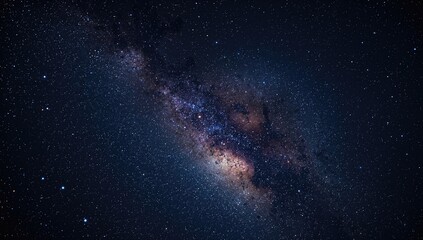 Glittering star dust and sparkling particles in a cosmic nebula against a dark starry night sky