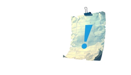 Crumpled paper with an exclamation mark hanging on a clip against a black background, illuminated