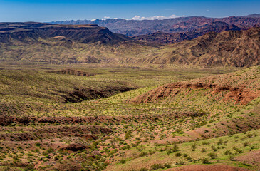 Green graces the hills along US Highway 93 in western Arizona along the Colorado River