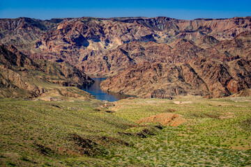 Green graces the hills along US Highway 93 in western Arizona along the Colorado River