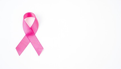 White backdrop featuring breast cancer awareness ribbon