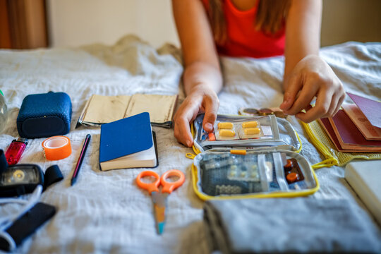 Emergency stock assembly - hands with first aid kit for go-bag