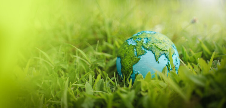 Protecting the green tree world with environment icons on nature background. Ecology and environment concept.