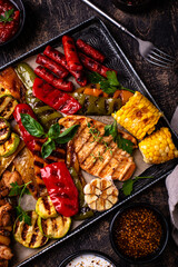 Assortment of grilled bbq meat and vegetables
