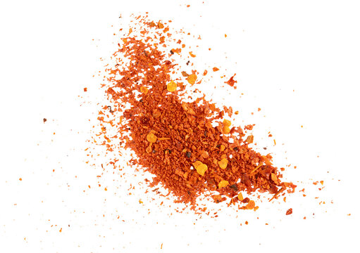 Flying ground red chili powder with crushed flakes, vibrant spicy paprika texture, hot pepper seasoning burst for culinary design and exotic food concept illustration