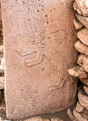 Detail view of stone carvings on T-shaped pillars at Gobeklitepe, the world’s oldest known temple complex, located in southeastern Turkey. © Tugrul